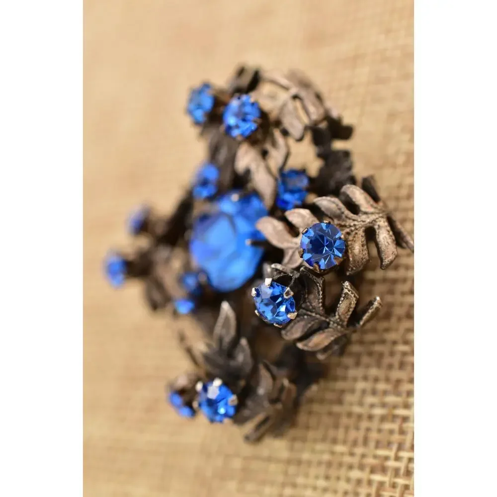 Vintage Austrian Blue Crystal Pin Brooch 3D Flower Gunmetal Tone 1960s BinBI